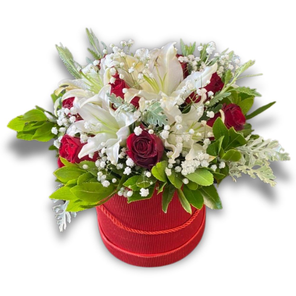 Red and white flower arrangement with roses, lilies, and baby’s breath in a red hatbox – same-day flower delivery Athens by flowershopping.gr