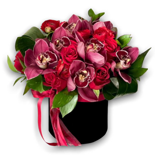 Brigitte’s Box flower arrangement with red roses and pink orchids