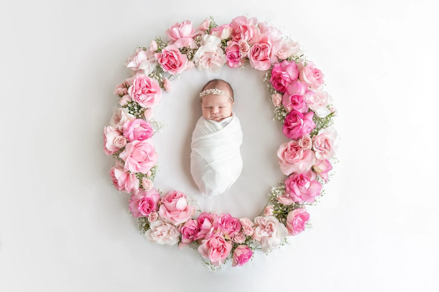 Welcoming a new baby with a delicate arrangement of soft-hued flowers from flowershopping.gr and a tender congratulatory note