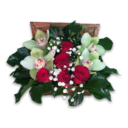 Trunk with orchids and roses