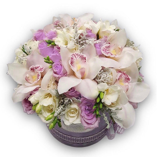 Triumph of Beauty – pink and white roses in a round flower box